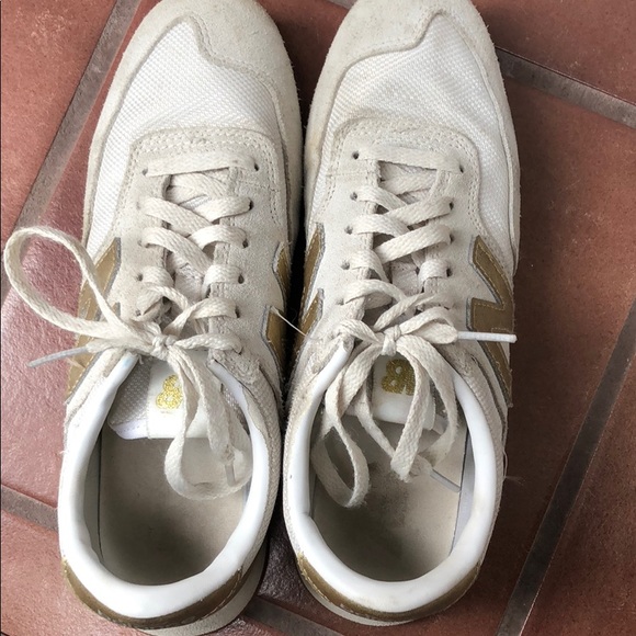 new balance 620 sneakers gold